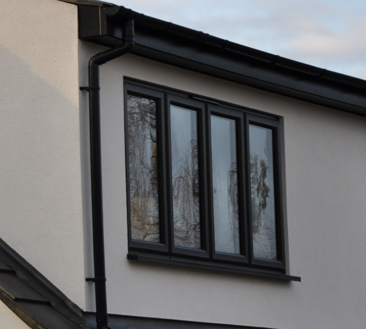 Sleek flush sash windows fitted to a modern UK home