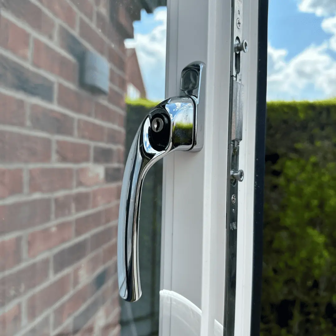 UPVC window handle close up chrome